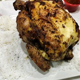 Pollo A L'Ast Con Arroz Y Alitas De Pollo Fritas (6 Uds.)