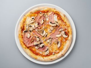 Pizza Prosciutto y funghi