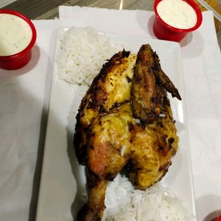 1/2 pollo con Arroz