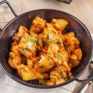 Ración De Patatas Bravas