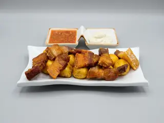 Papá Criolla Con Chicharroncitos