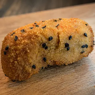 Berenjena escalivada con provolone y miel
