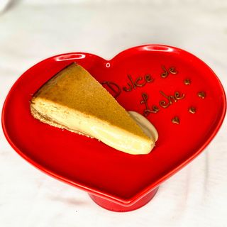 Porción de Tarta de Queso y Dulce de Leche