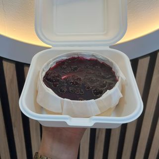 Cheesecake de Frutos Rojos (Porción)