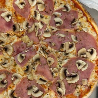Pizza Prosciutto y Funghi