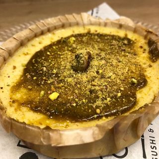 Cheescake individual de pistatxo.