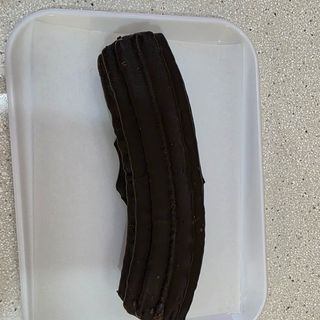 Churro de chocolate y crema .