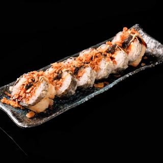 26B. Maki rebozado . Atún. Salmón. Aguacate. Salsa trufa.queso Philadelphia .Cebolla frita