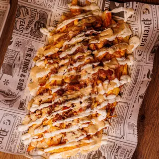 Papas Locas Con Cheddar Y Bacon