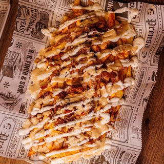 Papas Locas Con Cheddar Y Bacon