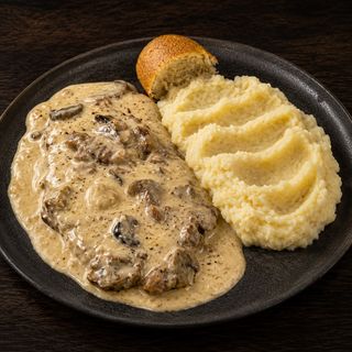 Chuletón con bechamel y cetas