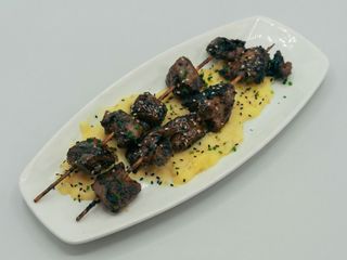 Brochetas de secreto de cerdo