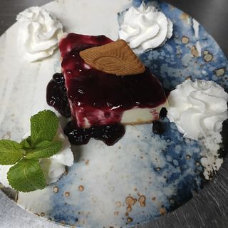 Tarta queso con mermelada arandanos