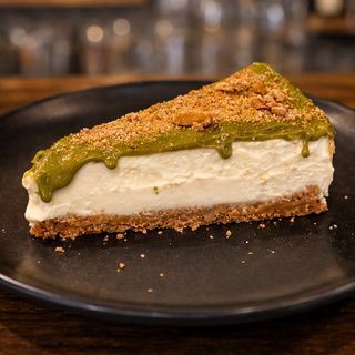 Cheesecake con crema de pistacho