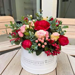 Box of assorted red and white flowers