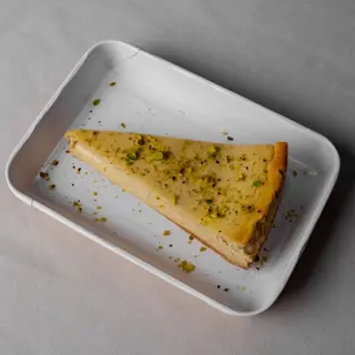Tarta De Queso Pistacho Porción