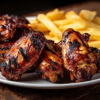 ALITAS DE POLLO A LA PARRILLA DE LEÑA