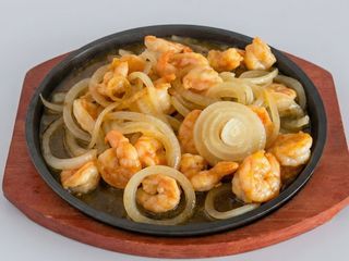 31. Langostino Con Salsa De Pimienta Negra