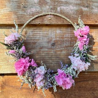 Aro de flores preservadas amor