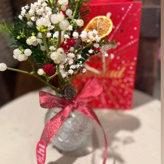 Muérdago con botella y bolsa Navideña