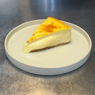 Tarta de mango y maracuyá · Porción