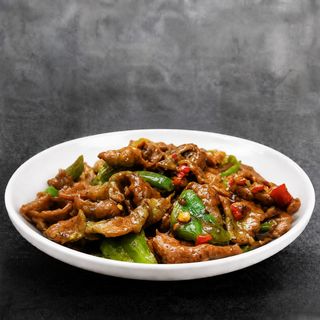 Ternera Con Salsa Picante Y Verdura