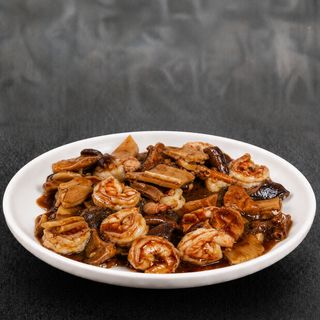 Gambas con bambú y setas chinas