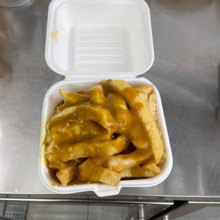 Chips cheese and curry sauce