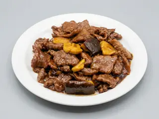 58. Ternera bambú y setas