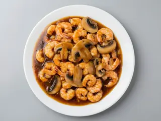 61. Gambas champiñones