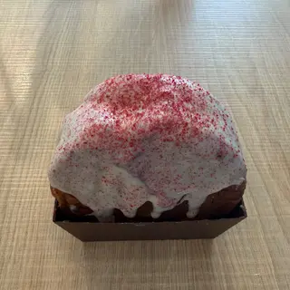 Roll de chocolate blanco con frutos rojos