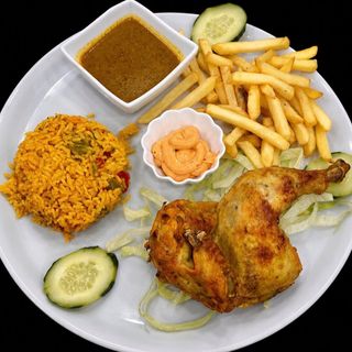 Medio pollo al horno con arroz