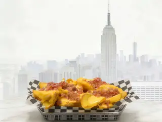 Patatas Fritas Con Queso Cheddar y Bacon