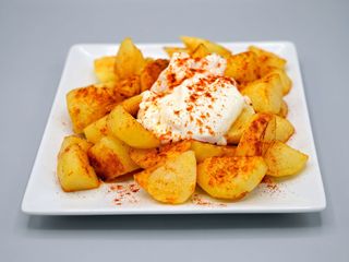PAPAS BRAVAS (PORCION)