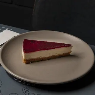 Porción De Tarta De Queso Y Arándanos