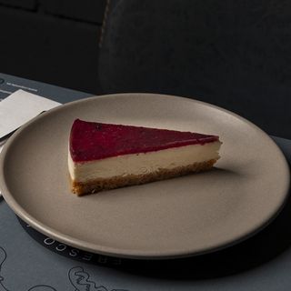 Porción De Tarta De Queso Y Arándanos