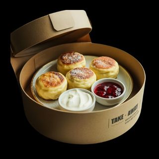 Syrniki - СЫРНИКИ с изюмом - Buñuelos de requesón в порции 4шт