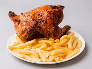 Medio pollo con patata