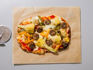 Botifarra de perol, carbassó, carxofa, gorgonzola