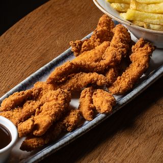 Tiras De Pollo De Corral Con Salsa Barbacoa