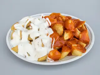 Ración De Patatas Bravioli