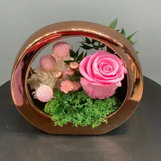 Centro con rosa rosa 