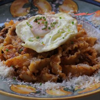 Raviolis con ragú a la bolonyesa