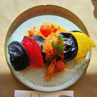 Mezzaluna negra de salmón y robiola