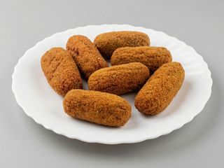 Croquetas de espinacas,pasas y piñones