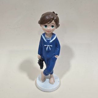 Niño.Comunión descalzo