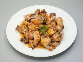 Carne De Conejo Al Ajillo