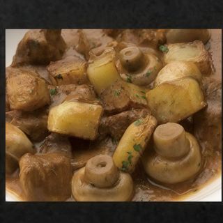 227. Ternera champiñones