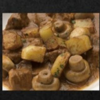 227. Ternera champiñones