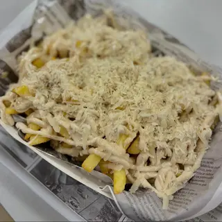 Patatas parmesanas con salsa de trufa